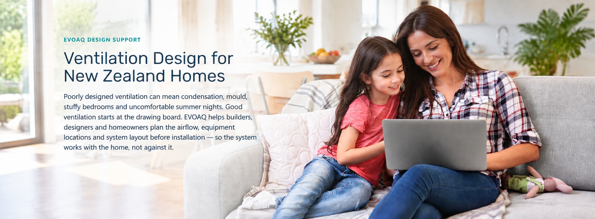Mother and daughter enjoying a comfortable home while using a laptop